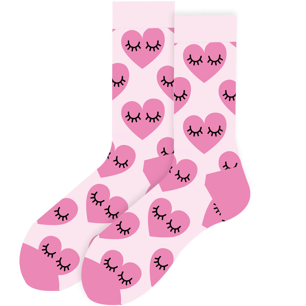Chaussettes femme rose clair motif coeurs rose foncé avec des yeux dedans noirs sur fond blanc