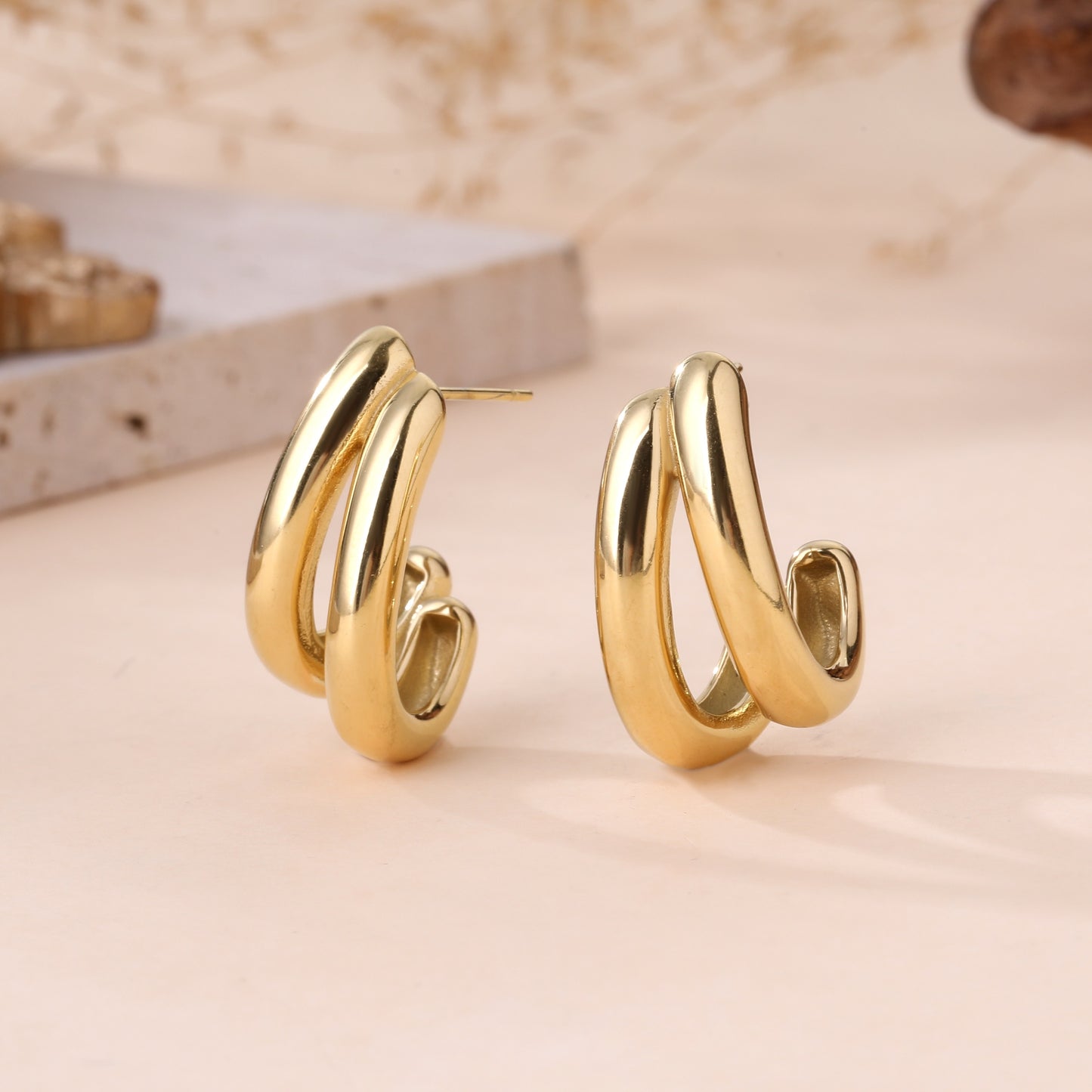 Boucles d’oreilles dorées doubles anneaux