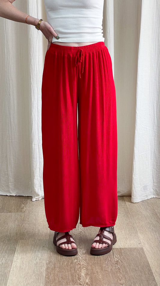 Pantalon fluide rouge taille élastique coupe large style bohème femme été