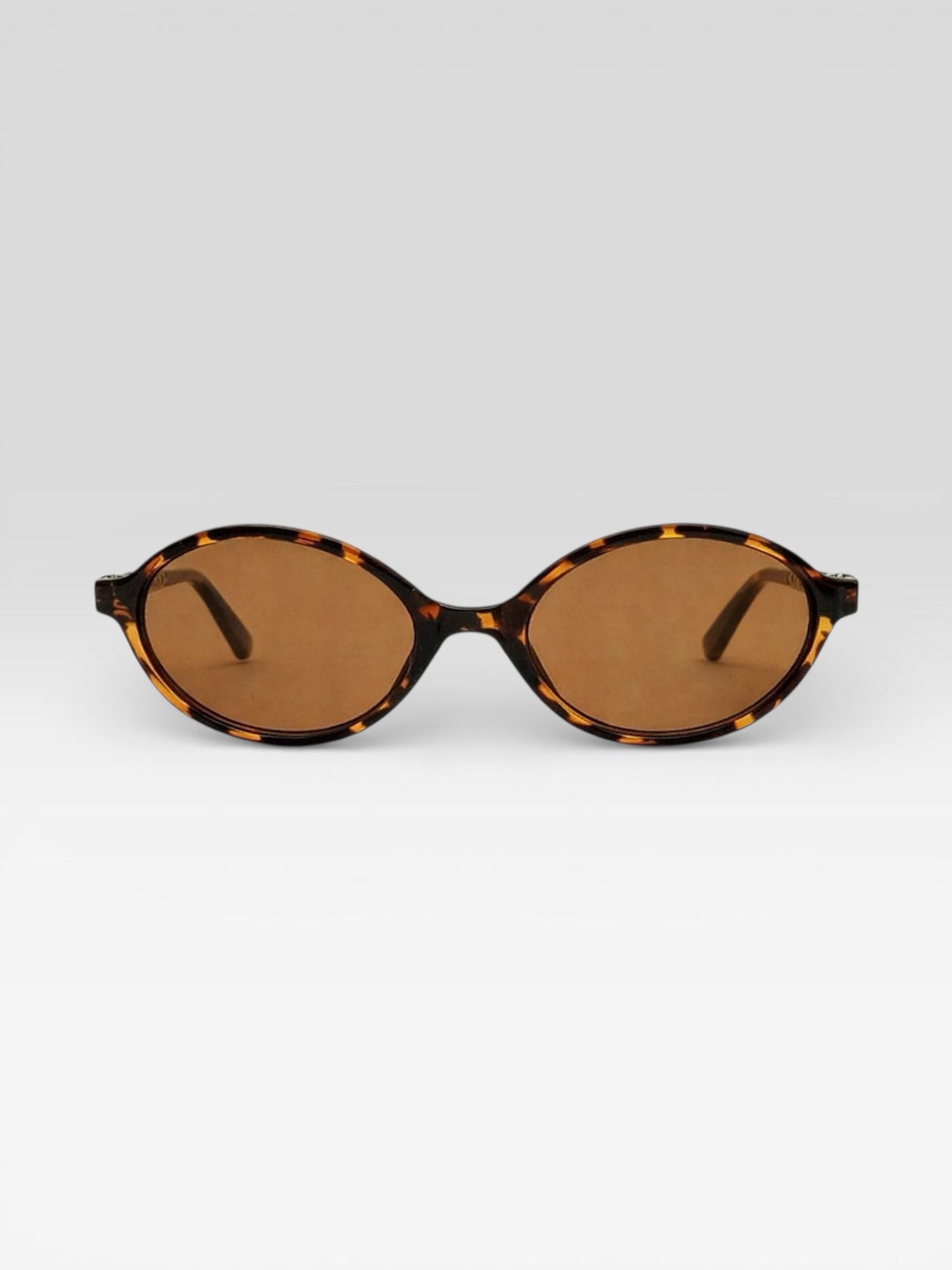 Lunettes de soleil ovales écaille de tortue marron vintage femme avec verres teintés ambrés style rétro