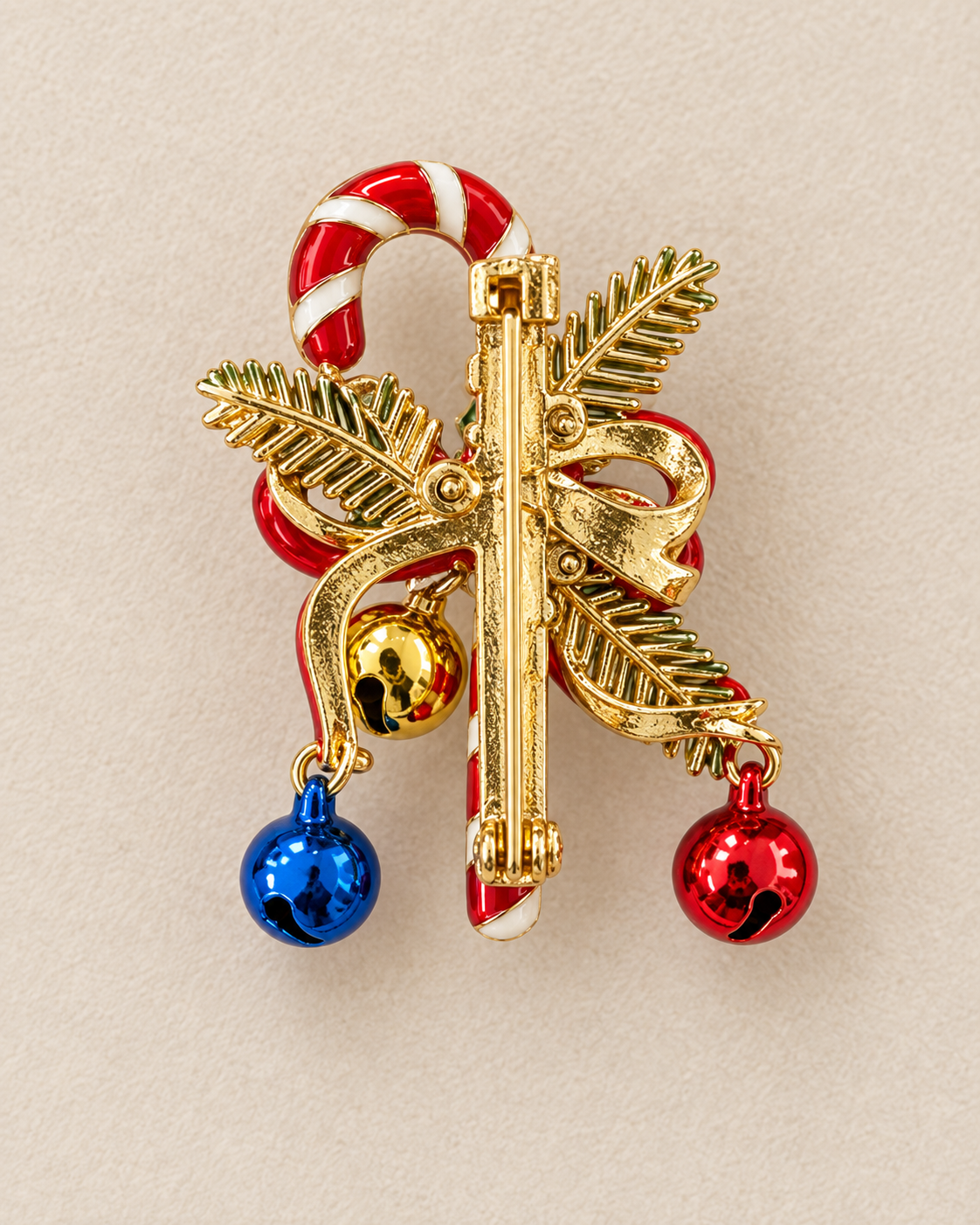 Broche sucre d'orge rouge et blanc avec charms boules de Noël colorées et feuillage doré accessoire festif femme