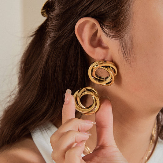 Boucles d’oreilles Nœud Twist Doré