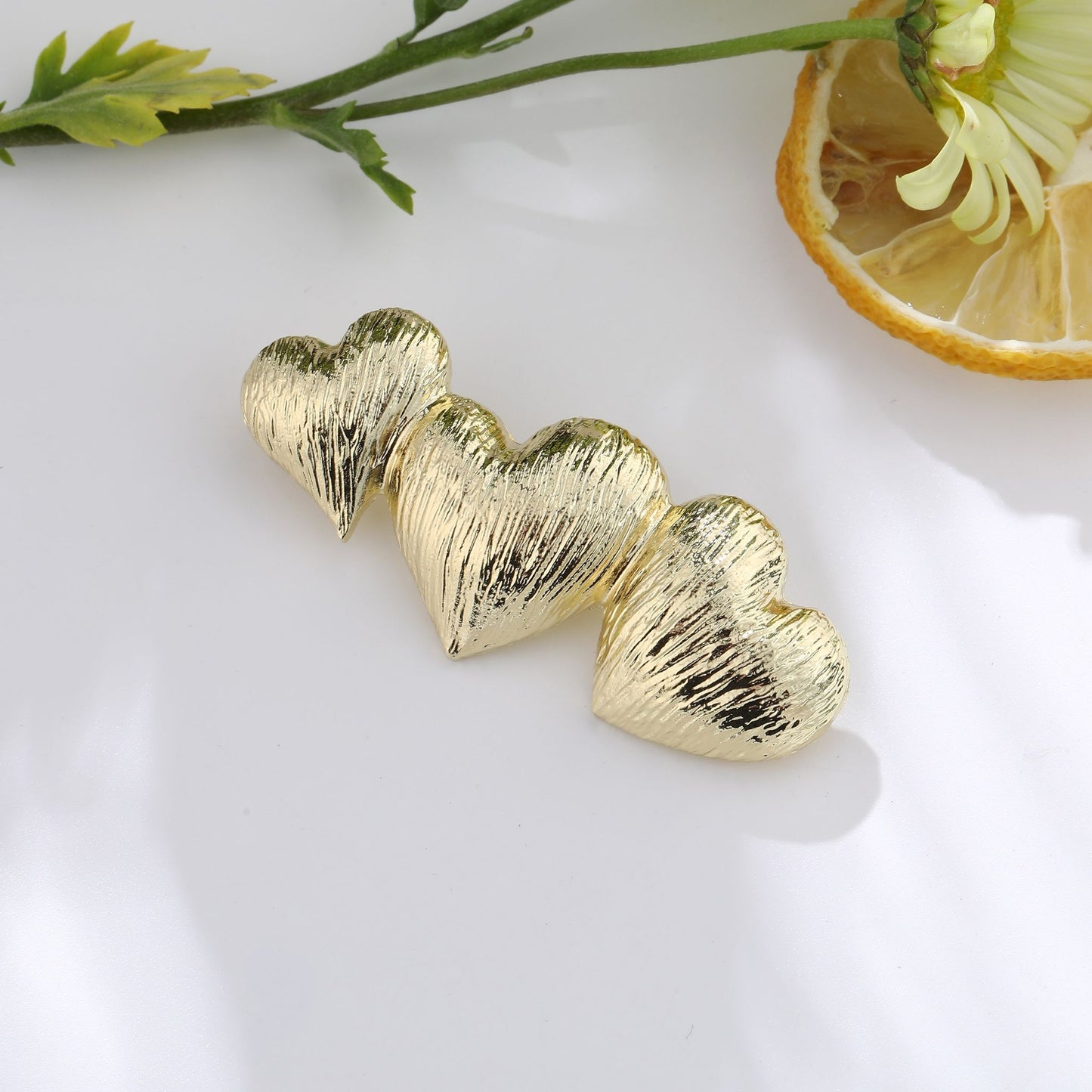 Broche coeurs