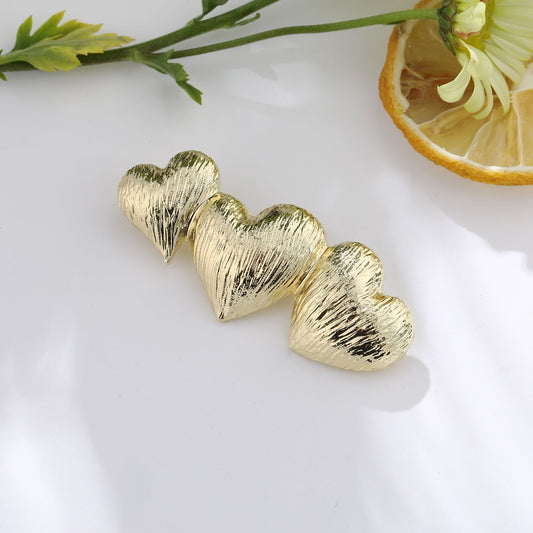 Broche coeurs