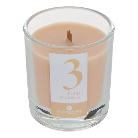 Bougie parfumée Numia Éclat d'Ambre couleur beige dans verre transparent décoration intérieure ambiance cosy