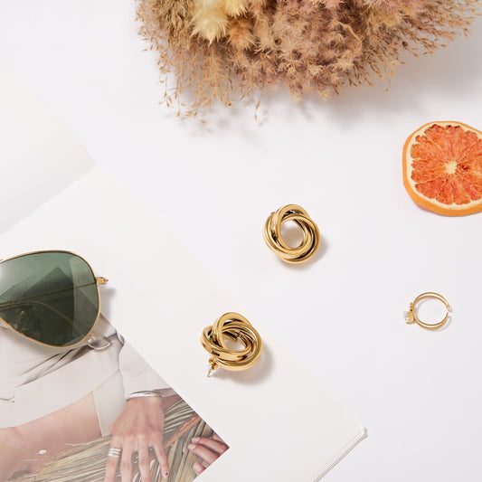 Boucles d’oreilles Nœud Twist Doré