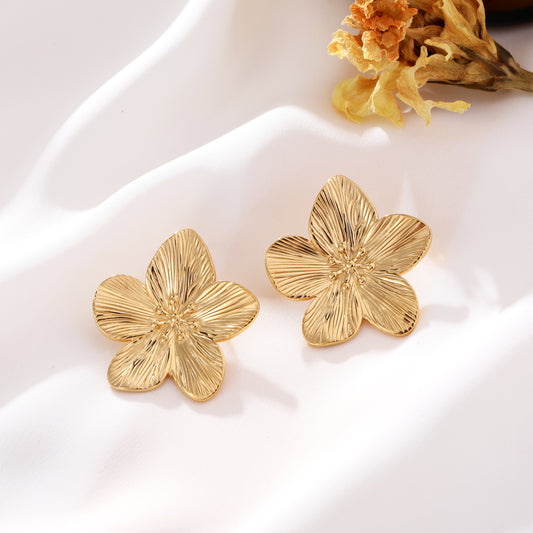 Boucles d’oreilles dorées fleurs