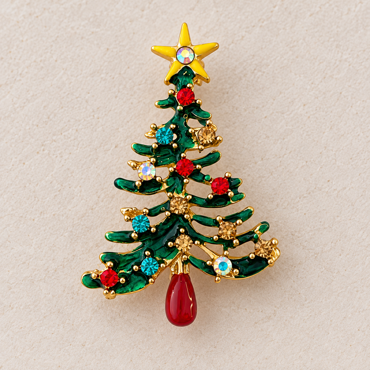 Broche sapin de Noël émaillée verte avec strass multicolores et étoile dorée, bijou fantaisie festif femme