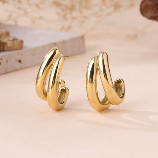 Boucles d’oreilles dorées doubles anneaux