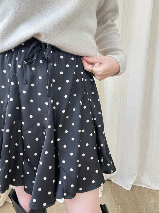 Jupe patineuse à pois noire et blanche taille élastique avec lien femme style rétro chic