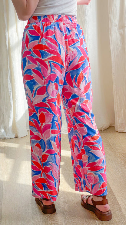 Pantalon fluide imprimé floral rose et bleu taille élastique coupe large femme été