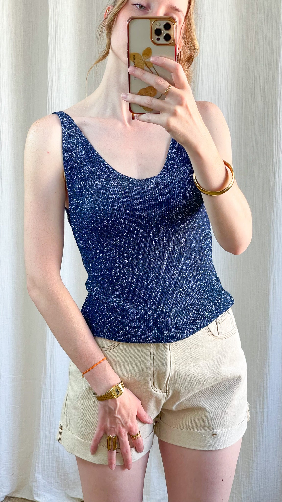 Top débardeur bleu nuit à paillettes lurex femme, maille fine scintillante, décolleté arrondi, style chic été