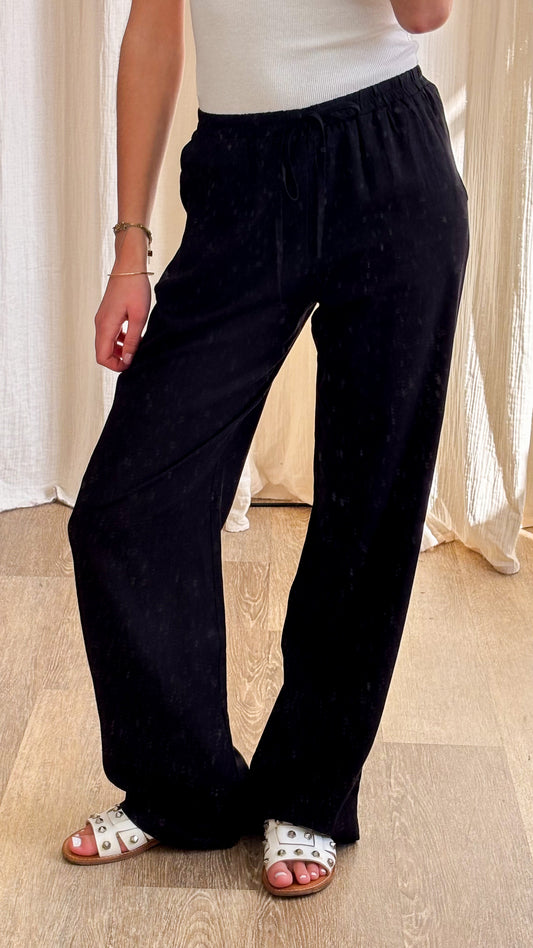 Pantalon Maya – Pantalon large noir fluide à taille élastiquée