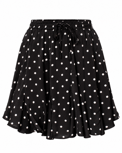 Mini jupe patineuse noire à pois blancs avec taille élastique et lien noué style rétro femme