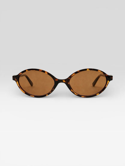 Lunettes de soleil ovales écaille de tortue marron vintage femme avec verres teintés ambrés style rétro
