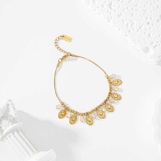 Bracelet chaîne dorée acier inoxydable avec breloques cœurs et pierres cristal femme style bohème chic