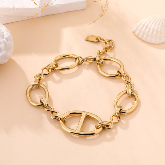 Bracelet chaîne maillons dorés style marin avec fermoir mousqueton bijou tendance femme