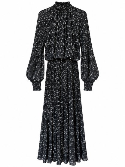 Robe longue noire à pois blancs col montant manches bouffantes jupe plissée fluide femme élégante