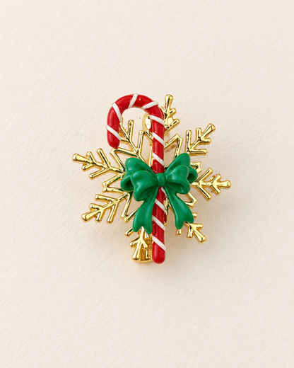 Broche flocon de neige dorée avec sucre d'orge rouge et blanc et noeud vert, accessoire bijou fantaisie Noël femme