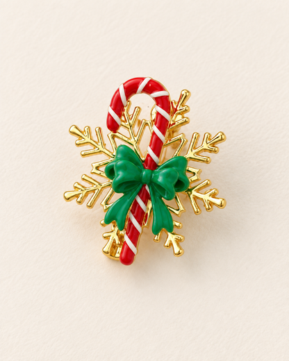 Broche dorée flocon de neige avec sucre d'orge rouge et blanc et nœud vert, accessoire fantaisie Noël femme
