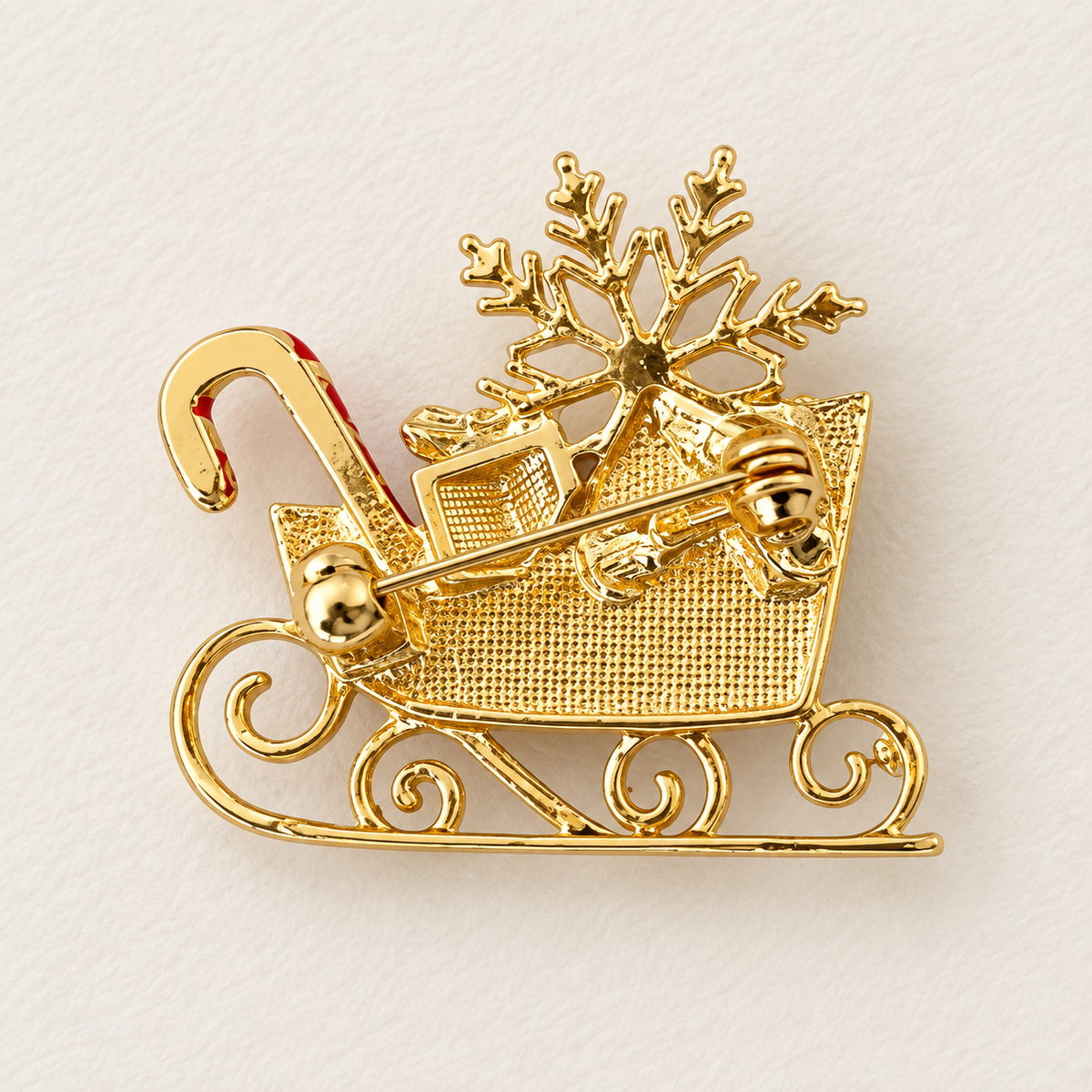 Broche traineau Père Noël dorée avec canne à sucre et flocon, accessoire bijou fantaisie fêtes Noël femme