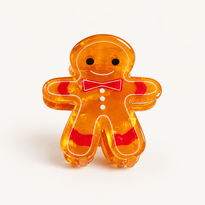Pince à cheveux bonhomme pain d'épice orange translucide avec noeud papillon rouge accessoire cheveux Noël femme