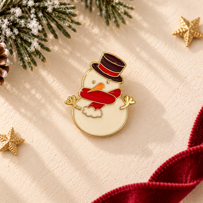 Pin's bonhomme de neige émaillé doré avec chapeau noir et écharpe rouge accessoire fantaisie Noël