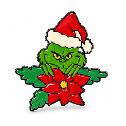 Pin's Grinch Noël vert avec bonnet rouge et fleur poinsettia, accessoire broche fantaisie fêtes de fin d'année
