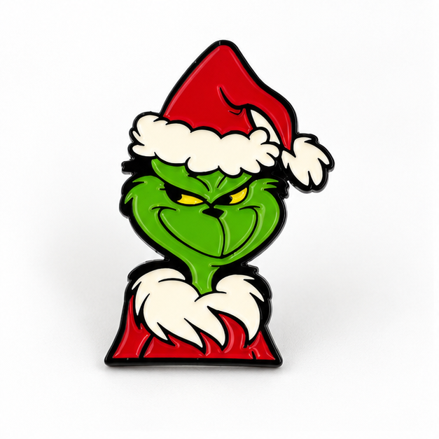 Pin's Grinch Noël émaillé vert et rouge avec bonnet Père Noël, accessoire fantaisie fêtes de fin d'année