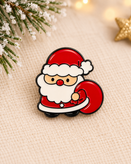Pin's émaillé Père Noël kawaii rouge et blanc avec sac cadeau, broche de Noël mignonne style cartoon pour accessoire festif