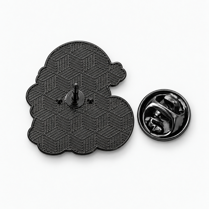 Pin's Père Noël métal noir finition brillante avec dos texturé géométrique et attache papillon, accessoire fantaisie Noël
