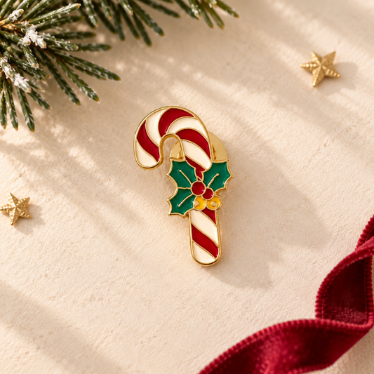 Pin's sucre d'orge émaillé rouge et blanc avec houx vert, accessoire fantaisie de Noël doré style vintage